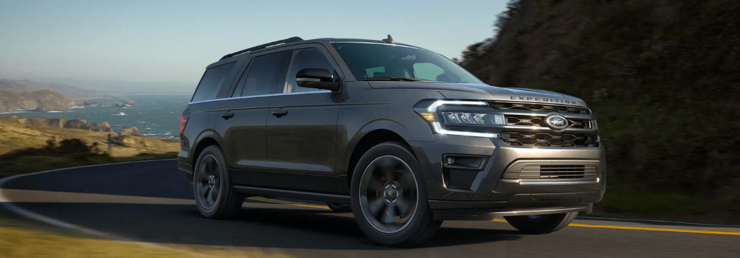 2023 Ford Expedition driving down a rural road