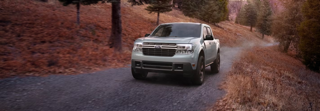 2024 Ford Maverick driving down a forest road